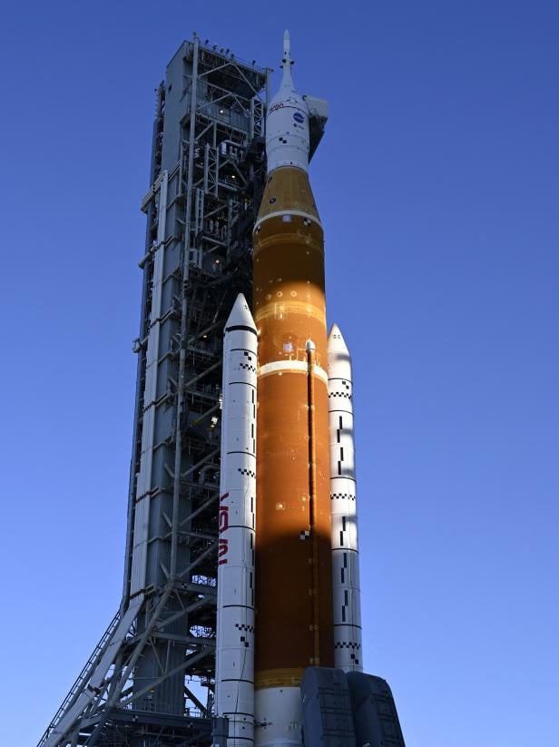 NASA's next-generation moon rocket begins its slow-motion journey from the VAB to its launch pad at Cape Canaveral