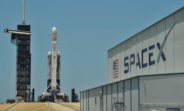 FILE PHOTO: A SpaceX Falcon Heavy rocket, carrying the U.S. Air Forces Space Test Program-2 mission, is shown during launch preparation at the Kennedy Space Center in Cape Canaveral