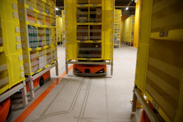 A robot is seen at the Amazon fulfilment center in Bretigny-sur-Orge near Paris