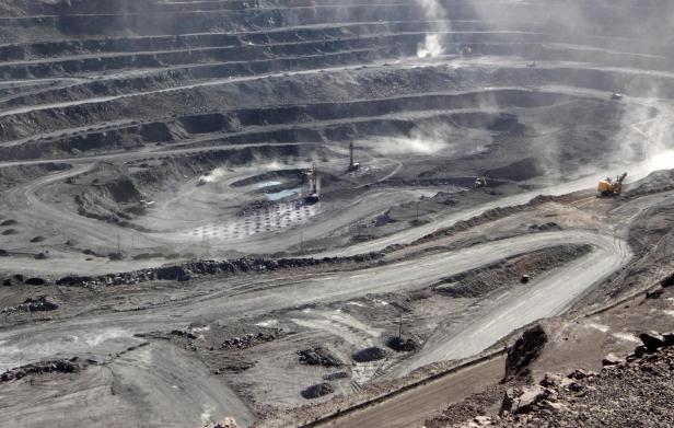 FILE PHOTO: Miners are seen at the Bayan Obo mine containing rare earth minerals, in Inner Mongolia