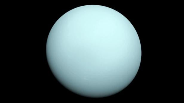 The planet Uranus appears light blue-green.  This is actually what Neptune looks like