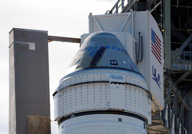 FILE PHOTO: Boeings Starliner spacecraft, aboard a United Launch Alliance Atlas 5 rocket, is prepared for launch