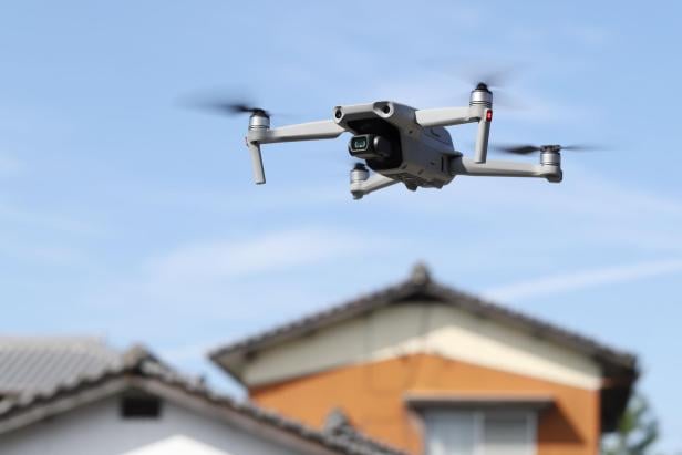 Drone flying near a private house