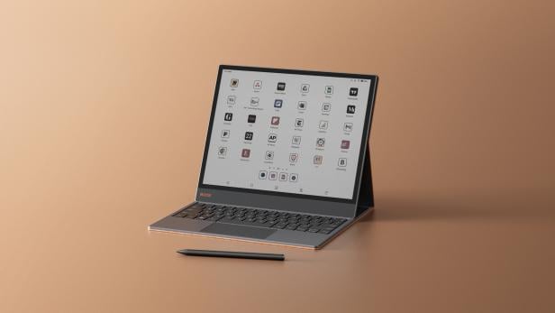 Ein Boox Tab X C Tablet mit Tastatur und Stift auf einem Tisch.