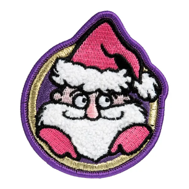 Das MAGMOJI-Badge „Gamer Elf“ in Weihnachtsoptik mit grünen und roten Details sowie Schriftzug ist als festliches Accessoire für MagSafe-Geräte gestaltet.