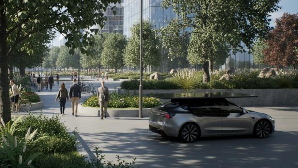 Elektroauto mit Solarwing steht auf einem schattigen Parkplatz.