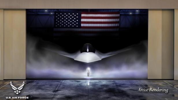 Konzeptgrafik des Kampfjets F-47, der in einem Hangar steht