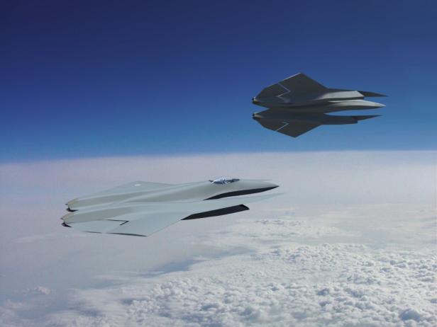 Zwei futuristische Tarnkappen-Kampfjets fliegen über einer Wolkendecke am Himmel.