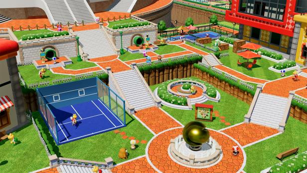 Bunte Tennisanlage im Pilz-Königreich mit Spielfiguren und mehreren Tennisplätzen.