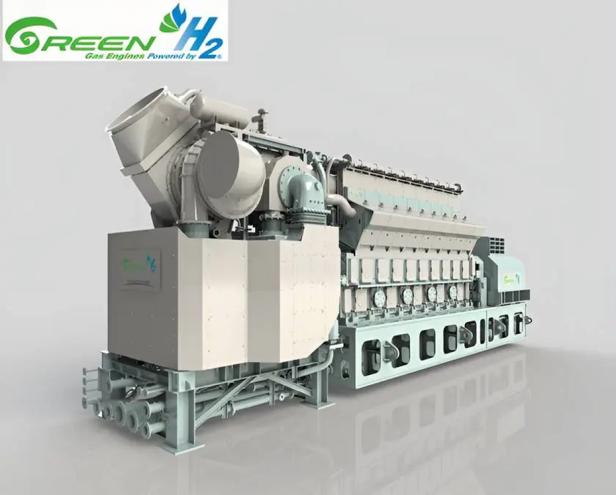 Große industrielle Gasturbine mit Wasserstofftechnologie in heller Umgebung.