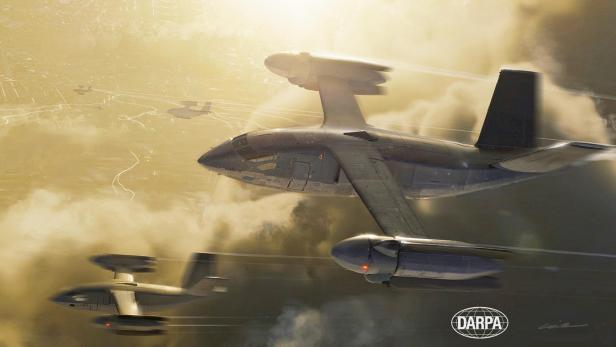 Ein X-76 Flugzeug fliegt über den Wolken bei Sonnenaufgang