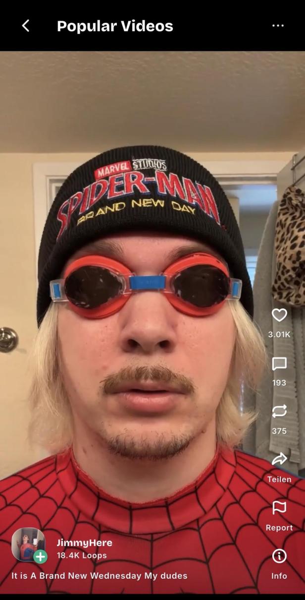 Vidoe in der Divne-App von JimmyHere, Spiderman-Mütze und rote Taucherbrille tragend.