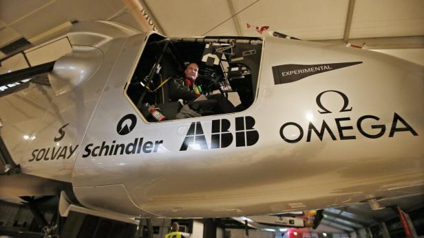 epa04644046 One of the two pilots of Solar Impulse 2 Bertrand Piccard prepares for the test flight in Abu Dhabi, UAE, 02 March 2015. After Solar Impulse 2 successfully accomplished the first test flight since the reassembly with the test pilot Markus Scherdel at the controls, the Solar Impulse 2 made the third test on 02 March 2015 with pilot Bertrand Piccard,. Solar Impulse 2, the only solar single-seater airplane able to fly day and night without a drop of fuel, will attempt the First Round-The-World Solar Flight in 07 March 2015. The aircraft departing from Abu Dhabi. Swiss founders and pilots, Bertrand Piccard and Andre Borschberg, will take turns flying Solar Impulse 2 over the Arabian Sea, to India, Myanmar, China, then across the Pacific Ocean, to the United States, and over the Atlantic Ocean to Southern Europe or Northern Africa before finishing the journey by returning to the initial departure point. EPA/ALI HAIDER