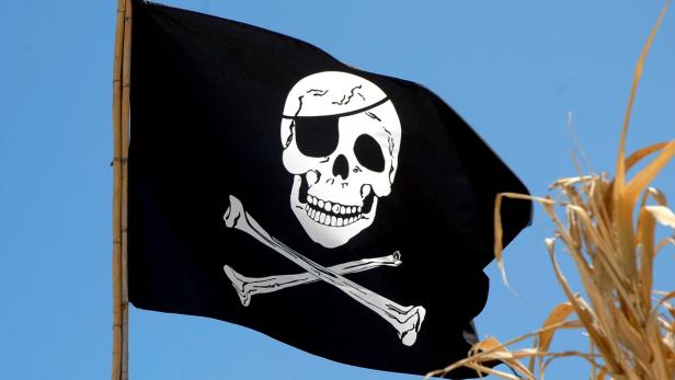 Jolly Roger &quot;Jolly Roger&quot;, auch &quot;Black Jack&quot; genannt, ist die charakteristische Totenkopfflagge der Piraten. Darauf befindet sich ein Totenschädel über zwei gekreuzten Säbeln oder Knochen. Dem modernen Pirat ist die Flagge vor allem als Markenzeichen des Hamburger Fußballvereins St. Pauli bekannt.