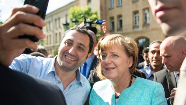 Ein Selfie mit Merkel wurde für einen syrischen Flüchtling zum Ausgangspunkt zahlreicher Anfeindungen (Symbolbild)