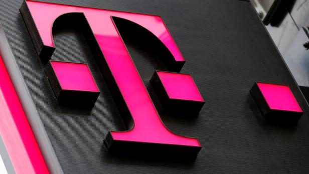 The logo of T-Mobile Austria is seen outside of one of its shops in Vienna, Austria, February 25, 2016. REUTERS/Leonhard Foeger/File Photo