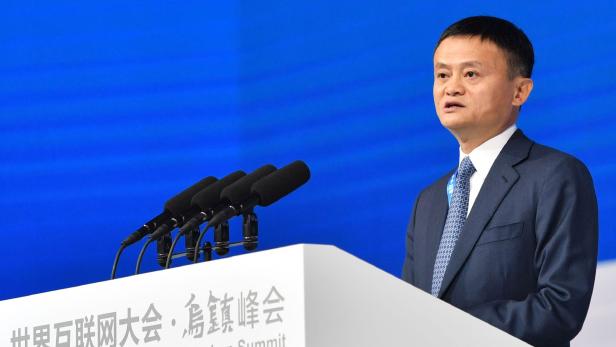 Alibaba Group Executive Chairman Jack Ma speaks during the opening ceremony of the 4th World Internet Conference in Wuzhen in China&#039;s eastern Zhejiang province on December 3, 2017. The conference is held in Wuzhen from December 3 to 5. / AFP PHOTO / - / China OUT