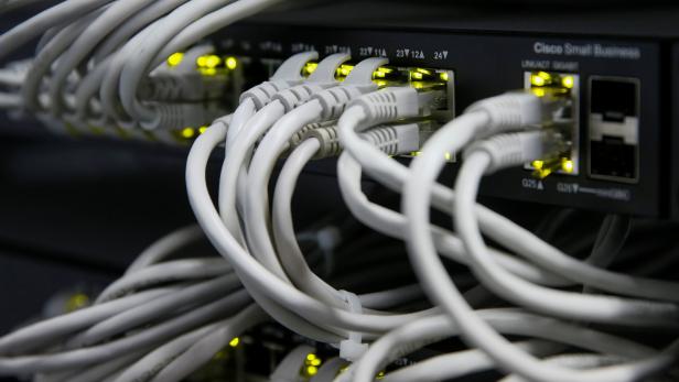 Ethernet cables used for internet connection are seen at the headquarters of the Wnet internet service provider in Kiev
