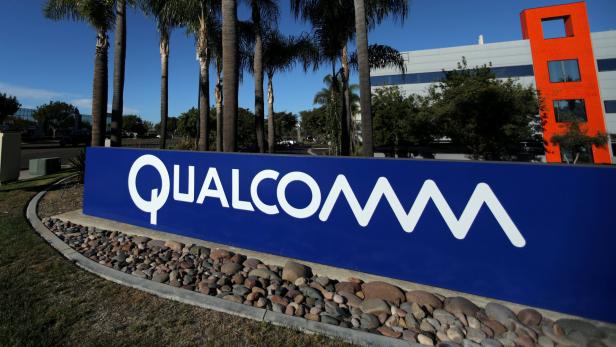 FILE PHOTO: A sign on the Qualcomm campus is seen in San Diego, California, U.S. November 6, 2017. REUTERS/Mike Blake/File Photo