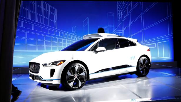 A Jaguar I-PACE self-driving car is pictured during its unveiling by Waymo in the Manhattan borough of New York City