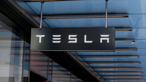 A sign is seen outside Tesla Motors' new showroom in Manhattan's Meatpacking District in New York City
