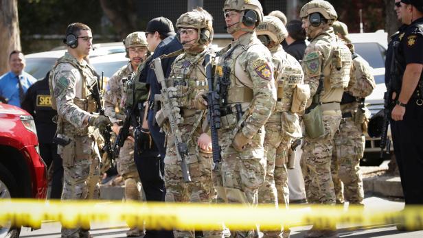 San Mateo County SWAT team officers are seen near Youtube headquarters following an active shooter situation in San Bruno, California