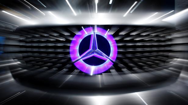 An illuminated logo of Mercedes is seen on the Mercedes-Benz F105 at an exhibition before the Daimler annual shareholder meeting in Berlin