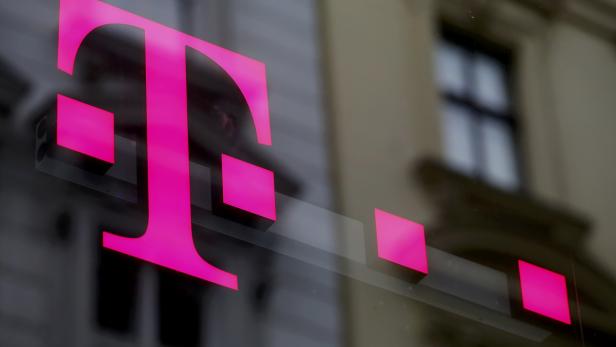 The logo of T-Mobile Austria is seen outside of one of its shops in Vienna