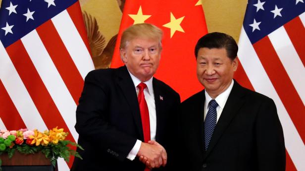 U.S. President Donald Trump and China's President Xi Jinping make joint statements at the Great Hall of the People in Beijing