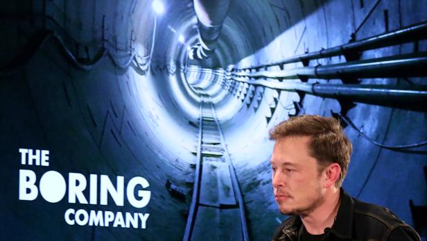 FILE PHOTO - Elon Musk arrives to speak at Boring Company community meeting in Bel Air, Los Angeles