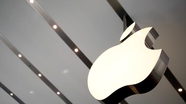 FILE PHOTO: Apple logo is pictured inside the newly opened Omotesando Apple store at a shopping district in Tokyo, Japan