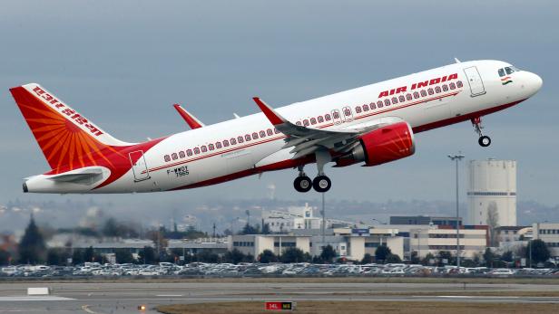 FILE PHOTO: An Air India Airbus A320neo plane takes off in Colomiers near Toulouse