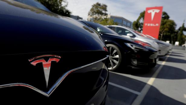 FILE PHOTO: A Tesla Model X is seen alongside a Model S at a Tesla electric car dealership in Sydney