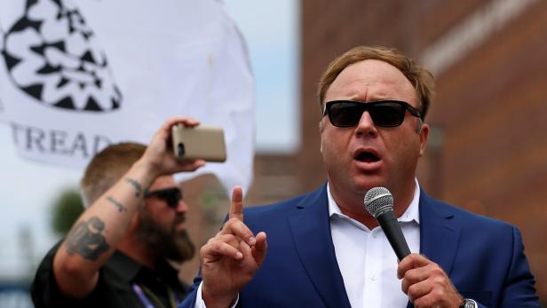 FILE PHOTO: Alex Jones from Infowars.com speaks during a rally in support of Republican presidential candidate Donald Trump near the Republican National Convention in Cleveland