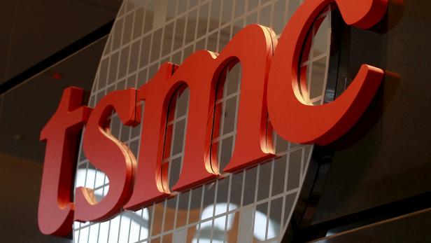 The logo of Taiwan Semiconductor Manufacturing Co Ltd (TSMC) is seen at its headquarters in Hsinchu