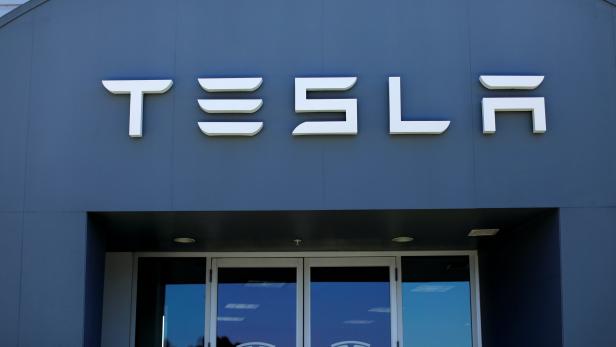 FILE PHOTO: A Tesla sales and service center in Costa Mesa California