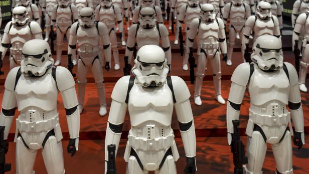 Models of First Order's Stormtrooper Battle Buddy from the film "Star Wars - The Force Awakens" are displayed in a shop in Shanghai