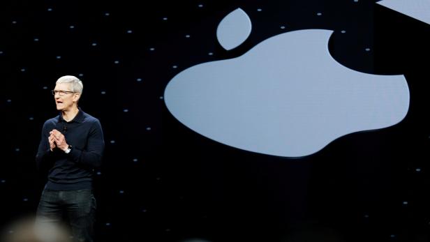FILE PHOTO: Apple Chief Executive Officer Tim Cook speaks at the Apple Worldwide Developer conference (WWDC) in San Jose