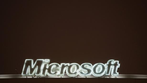 FILE PHOTO: A view shows the logo of Microsoft company on the roof of an office building in Moscow