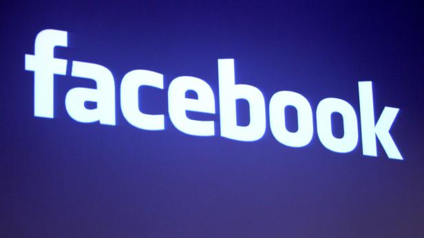 FILE PHOTO: The Facebook logo at Facebook headquarters in Palo Alto