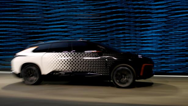 FILE PHOTO: A Faraday Future FF 91 electric car takes off across the stage in an exhibition of speed during an unveiling event at CES in Las Vegas