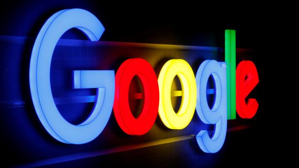 FILE PHOTO: An illuminated Google logo is seen in Zurich