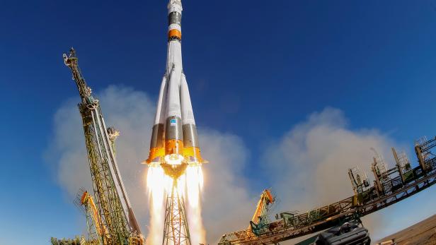 FILE PHOTO: The Soyuz MS-10 spacecraft carrying the crew of astronaut Nick Hague of the U.S. and cosmonaut Alexey Ovchinin of Russia blasts off to the International Space Station (ISS) from the launchpad at the Baikonur Cosmodrome