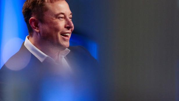 Tesla and SpaceX CEO Musk smiles during a "fireside chat" at the NLC 2018 City Summit in Los Angeles