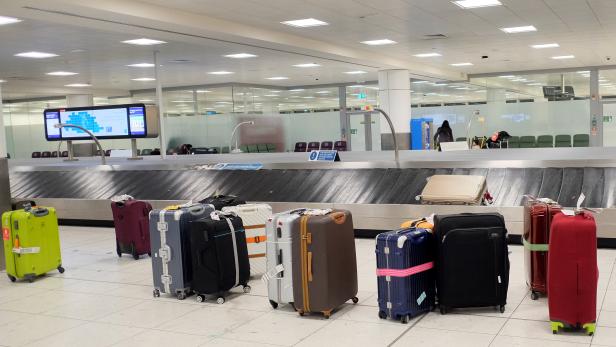 Luggage waiting to be collected by passengers is seen at London Gatwick Airport in London