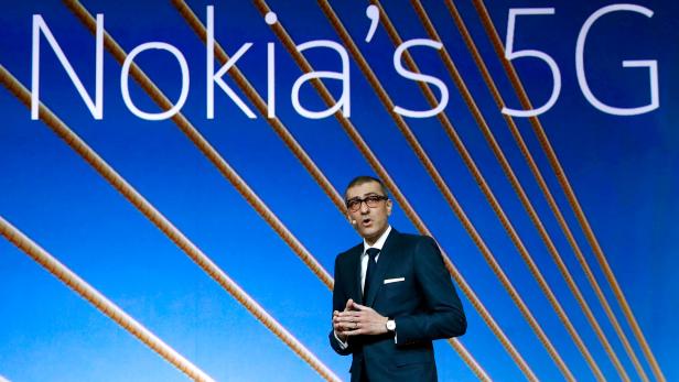 FILE PHOTO: Rajeev Suri, Nokia's President and Chief Executive Officer, speaks during the Mobile World Congress in Barcelona