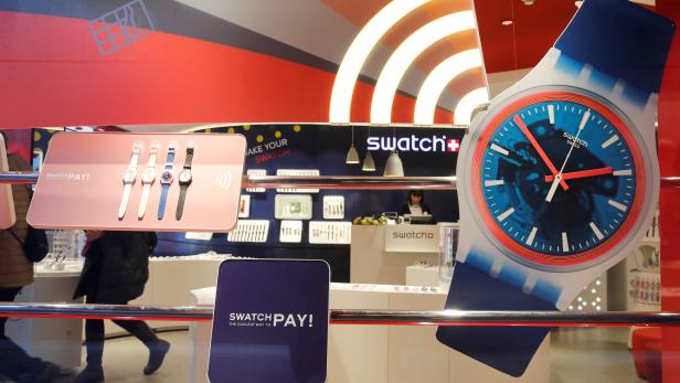 FILE PHOTO: Watches are displayed in a window of a store of Swiss manufacturer Swatch in Zurich