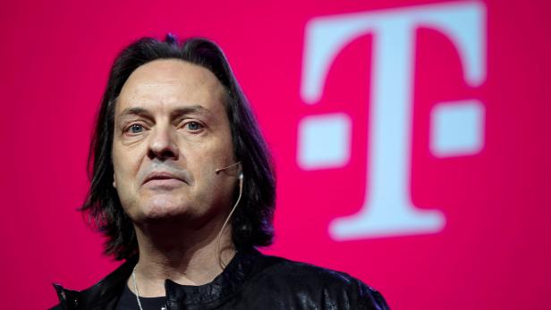 FILE PHOTO: T-Mobile CEO Legere speaks to guests during their company's Un-carrier 9.0 event in New York