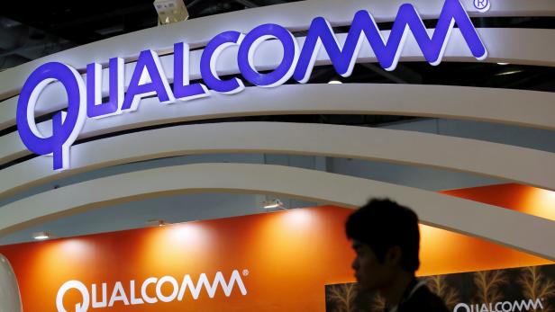FILE PHOTO: Qualcomm's logo is seen at its booth at the Global Mobile Internet Conference (GMIC) 2015 in Beijing