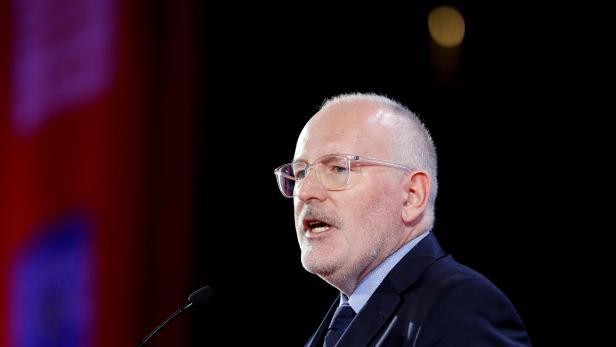 FILE PHOTO: Frans Timmermans, the newly elected Party of European Socialists President, speaks during the Party of European Socialists annual meeting in Lisbon